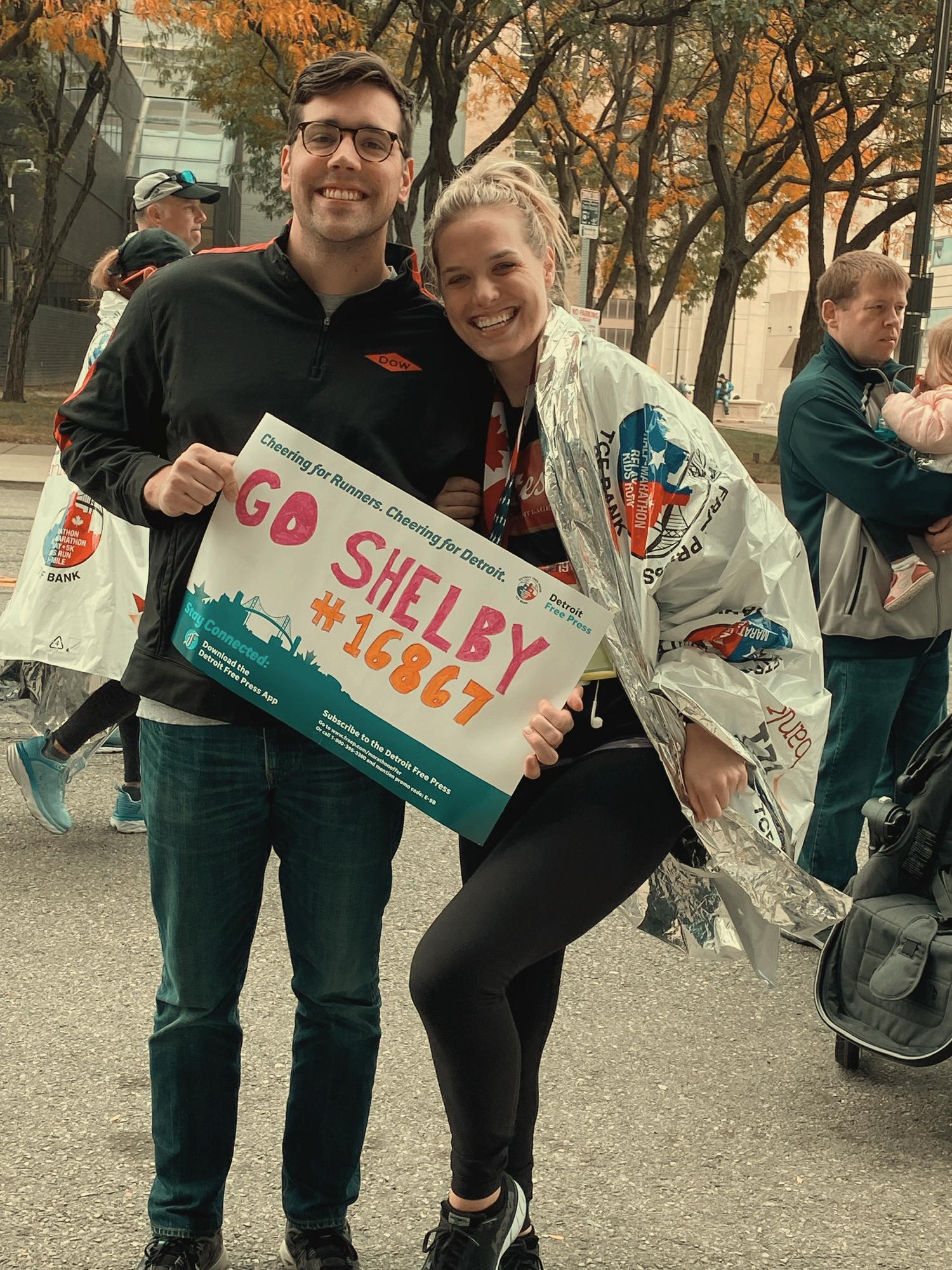 Ryan supporting shelby at the Detroit Freepress half marathon