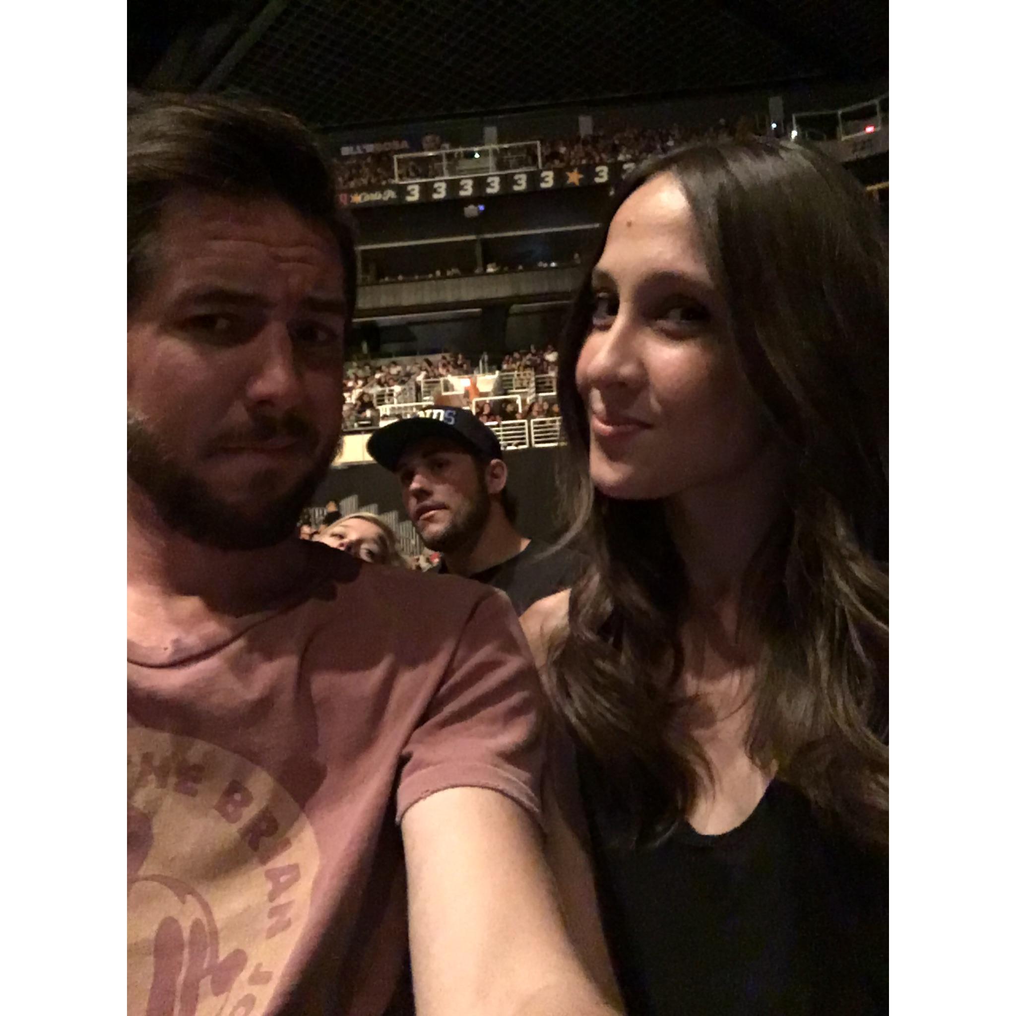 Devin and I at our first show together as a couple. We went to see J. Cole!
