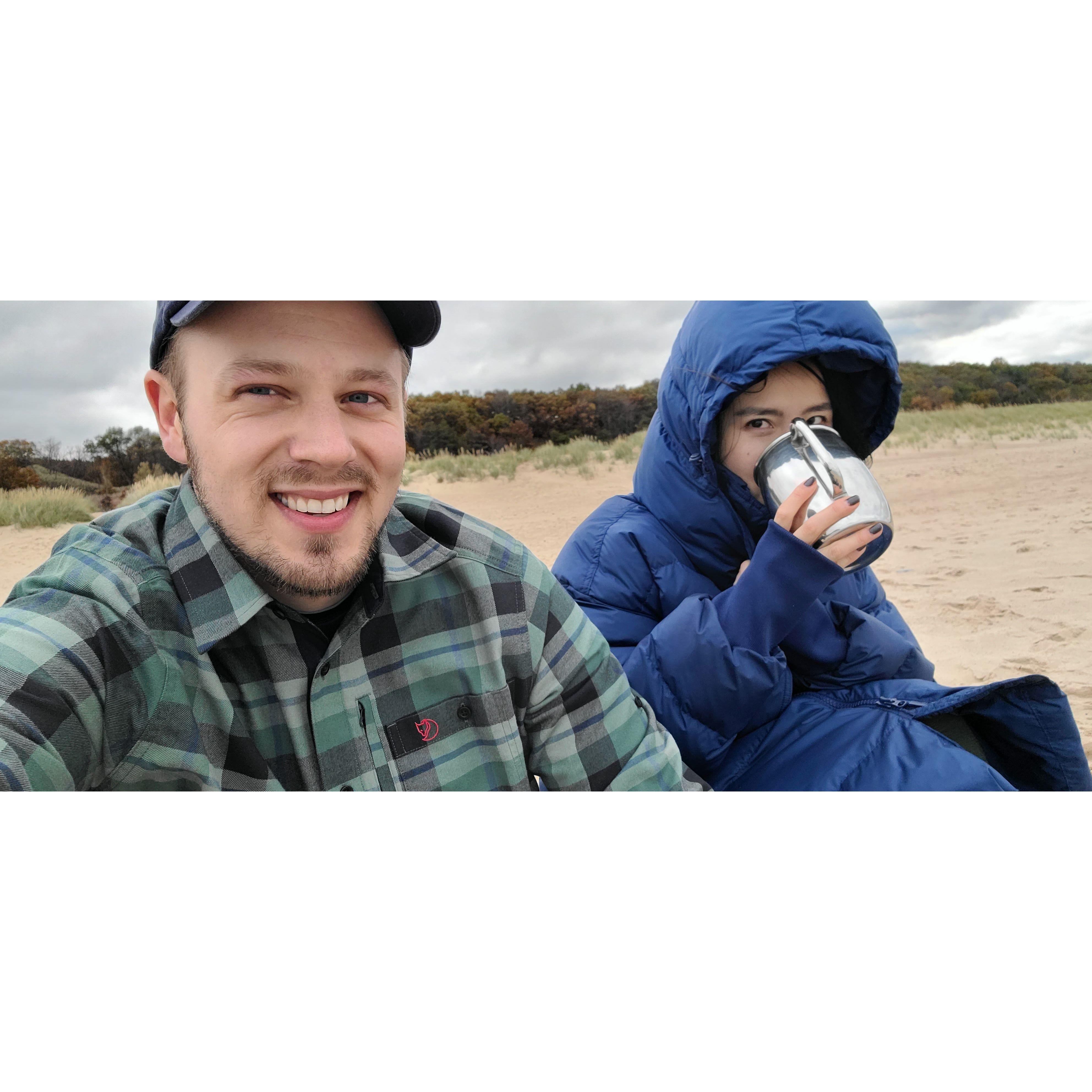 Hiking trip in the Indiana Dunes National Park enjoying a hot drink on the beach. [Oct 2023]