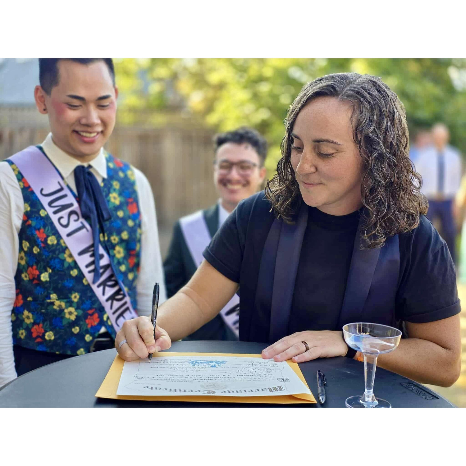 Completing the marriage certificate with our officiant Liz.