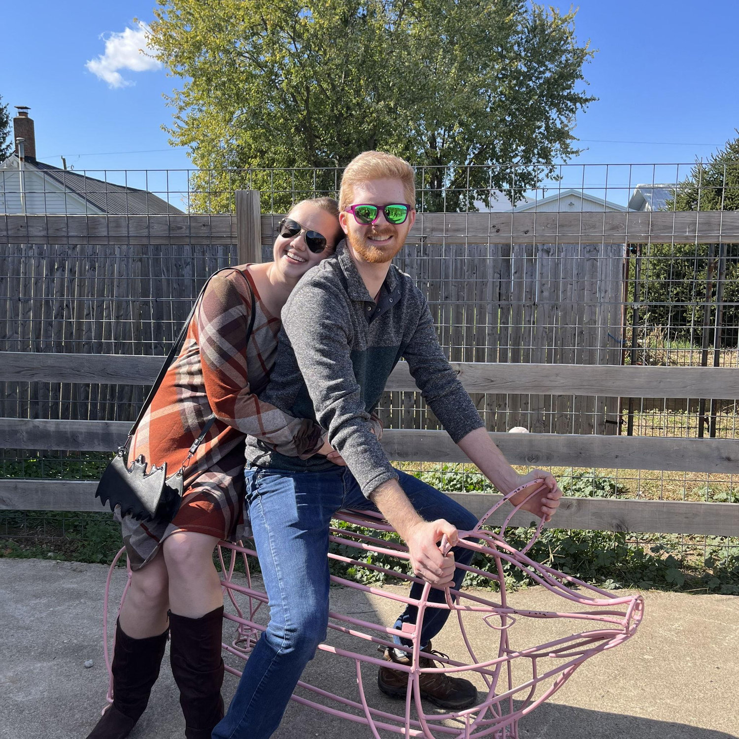 Riding a pig together, October 2024.