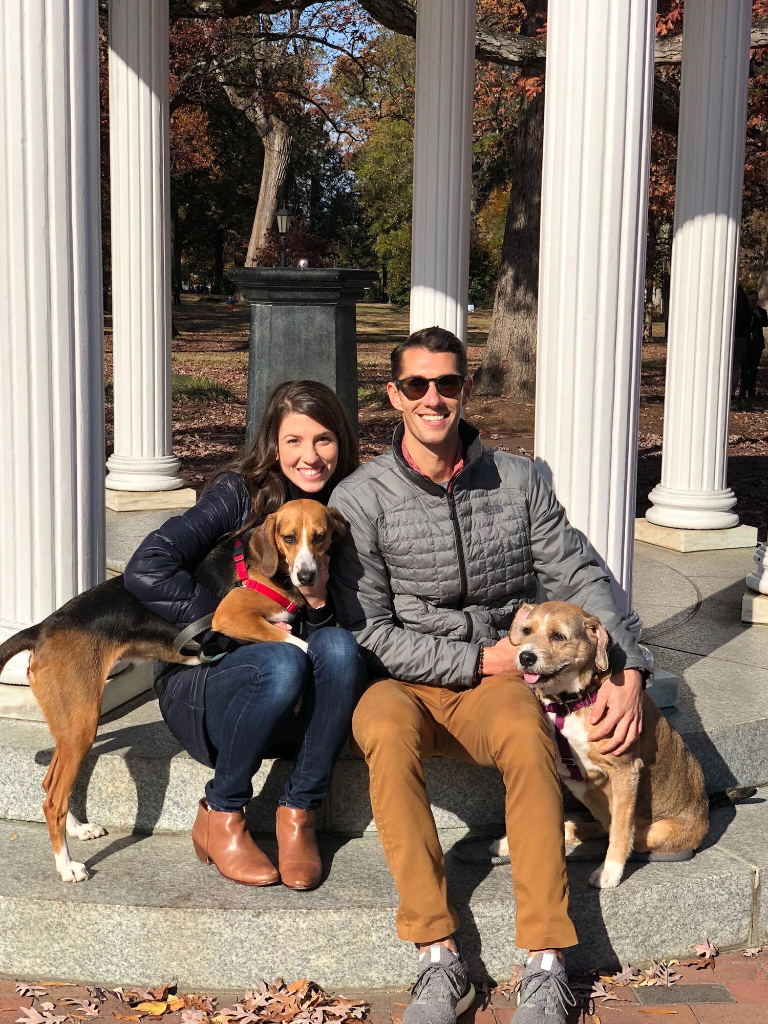 Taking our pups, Bailey and Lucy, for a walk on UNC’s campus