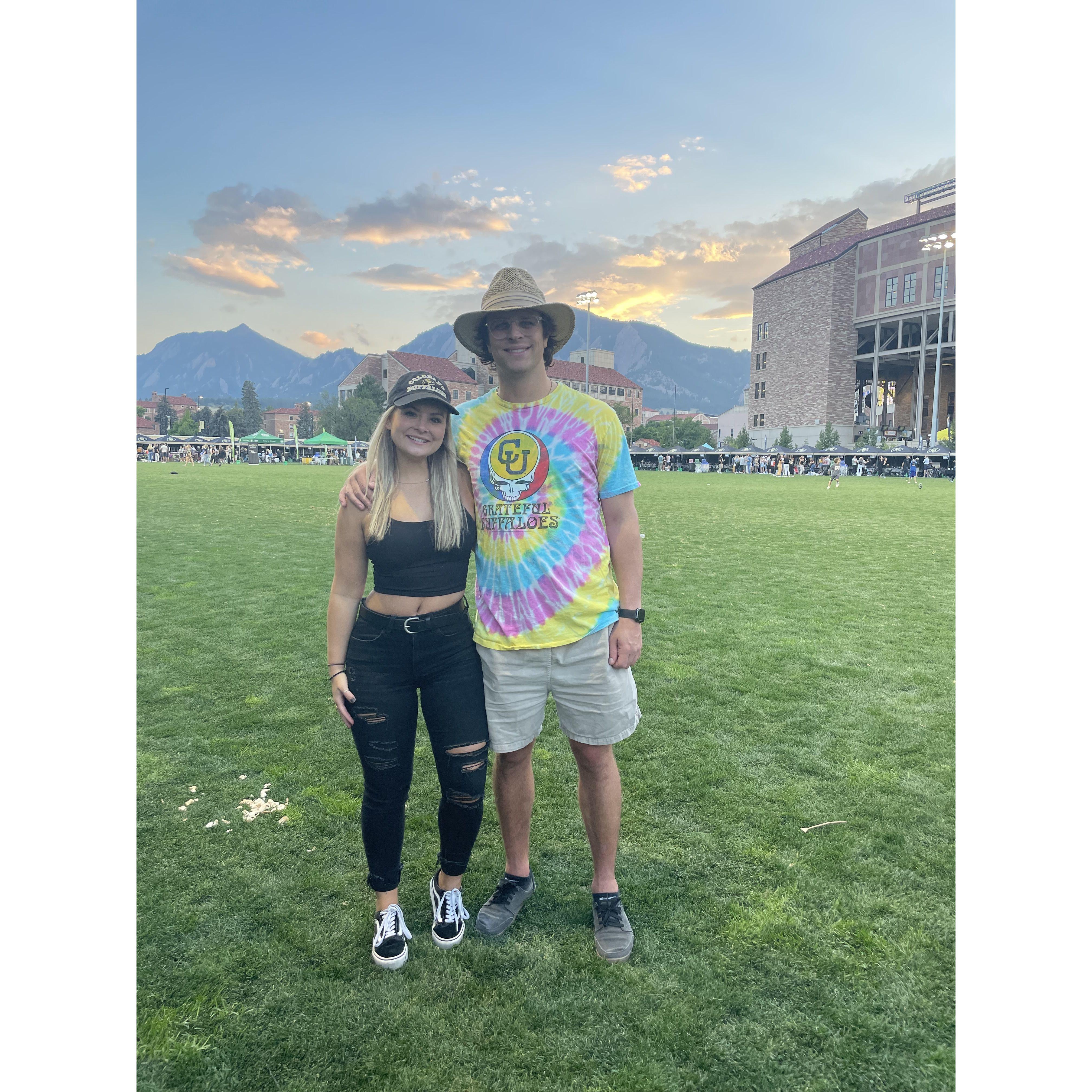 The best view of the Flatirons while tailgating at Folsom Field
