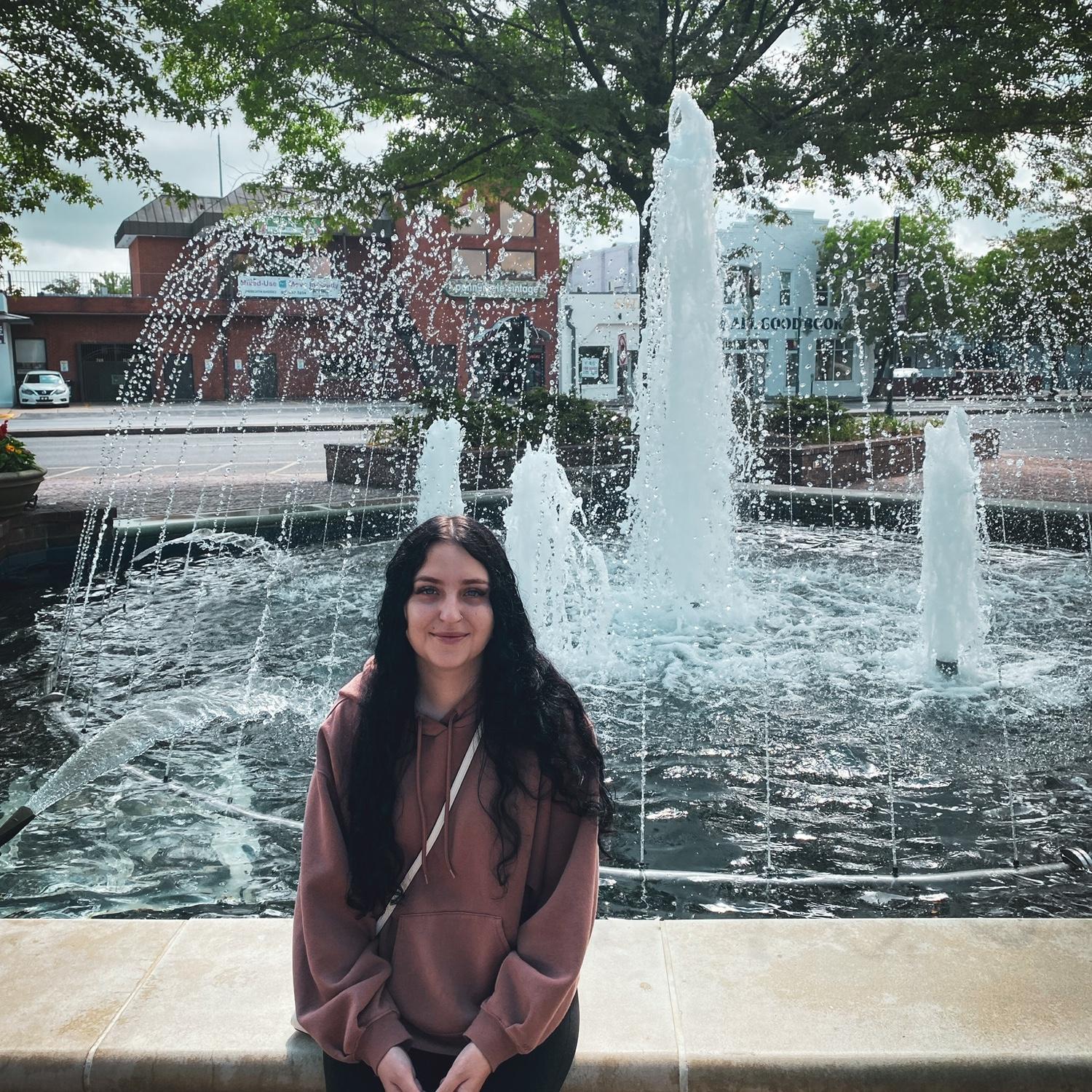 Ani in front of the Five Points Fountain in South Carolina. (Columbia, SC)