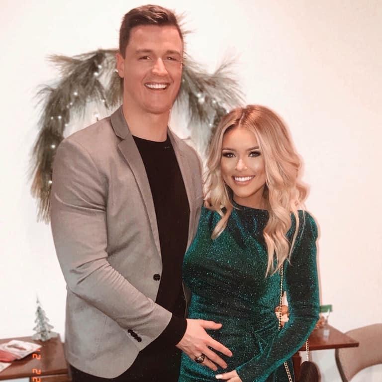 Heather and Christian at a friends engagement party when Heather first started showing.