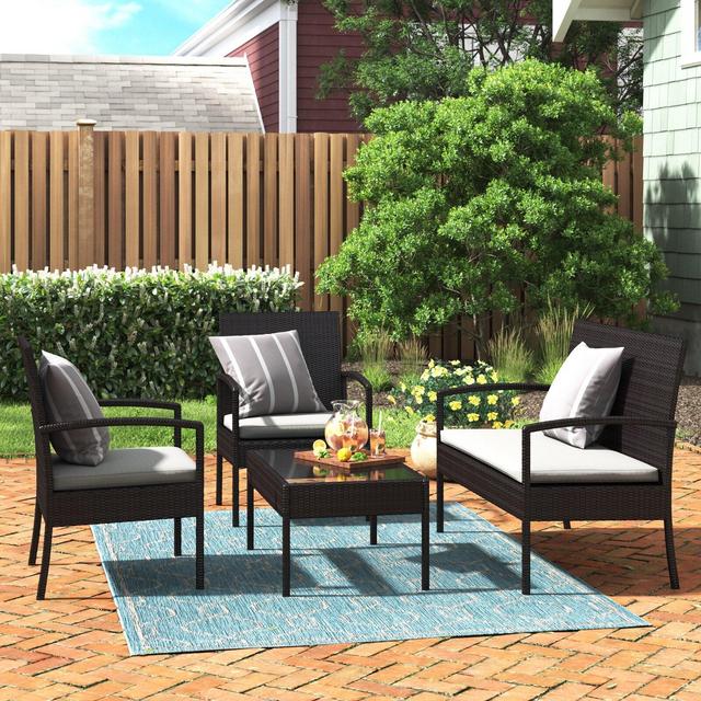 Kari 4 Piece Rattan Sofa Seating Group with Cushions