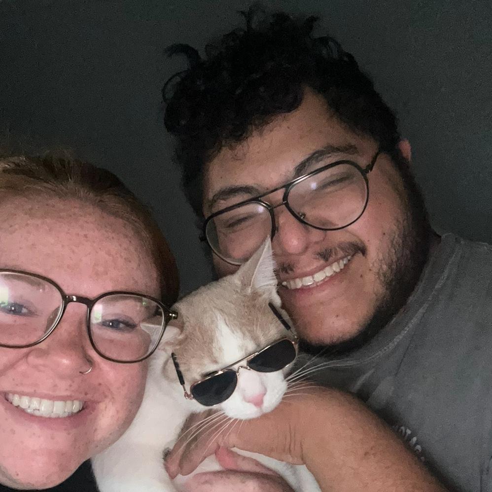 With our cat, Quesito