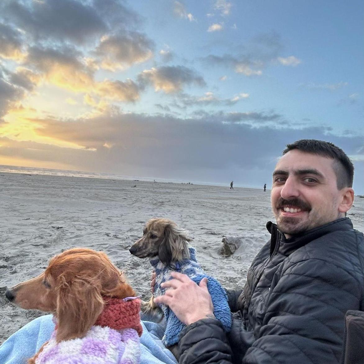 The dogs at the Seaside, OR watching the sunset.