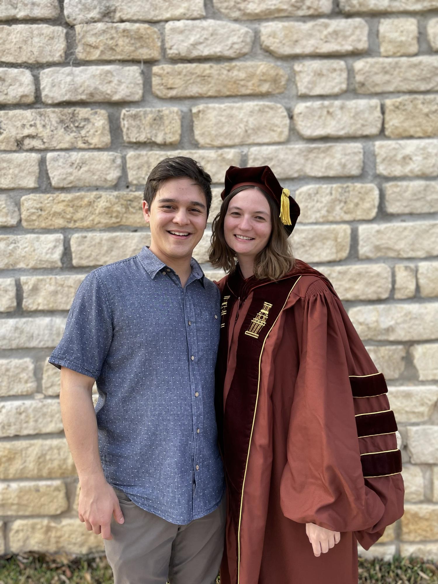 When Sam couldn’t make it to my graduation, I made him take photos with me in my robe three months early.