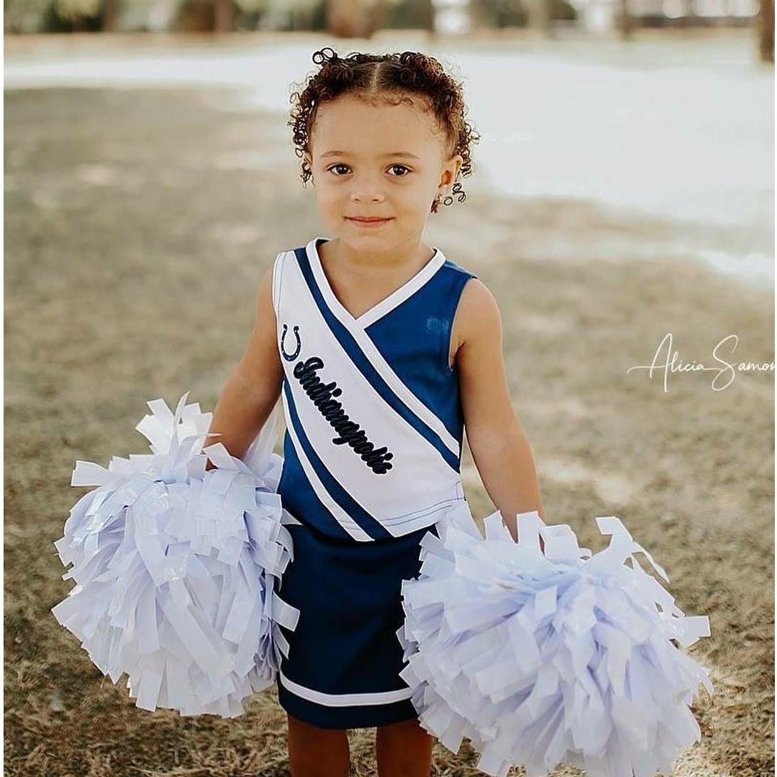 Caydence is our little gymnast and cheerleader.