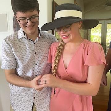Us announcing our engagement to our families after a private proposal on the beach.
