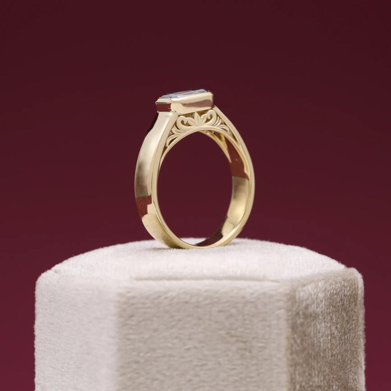 Francis’s engagement ring, featuring floral architectural details on the side.
