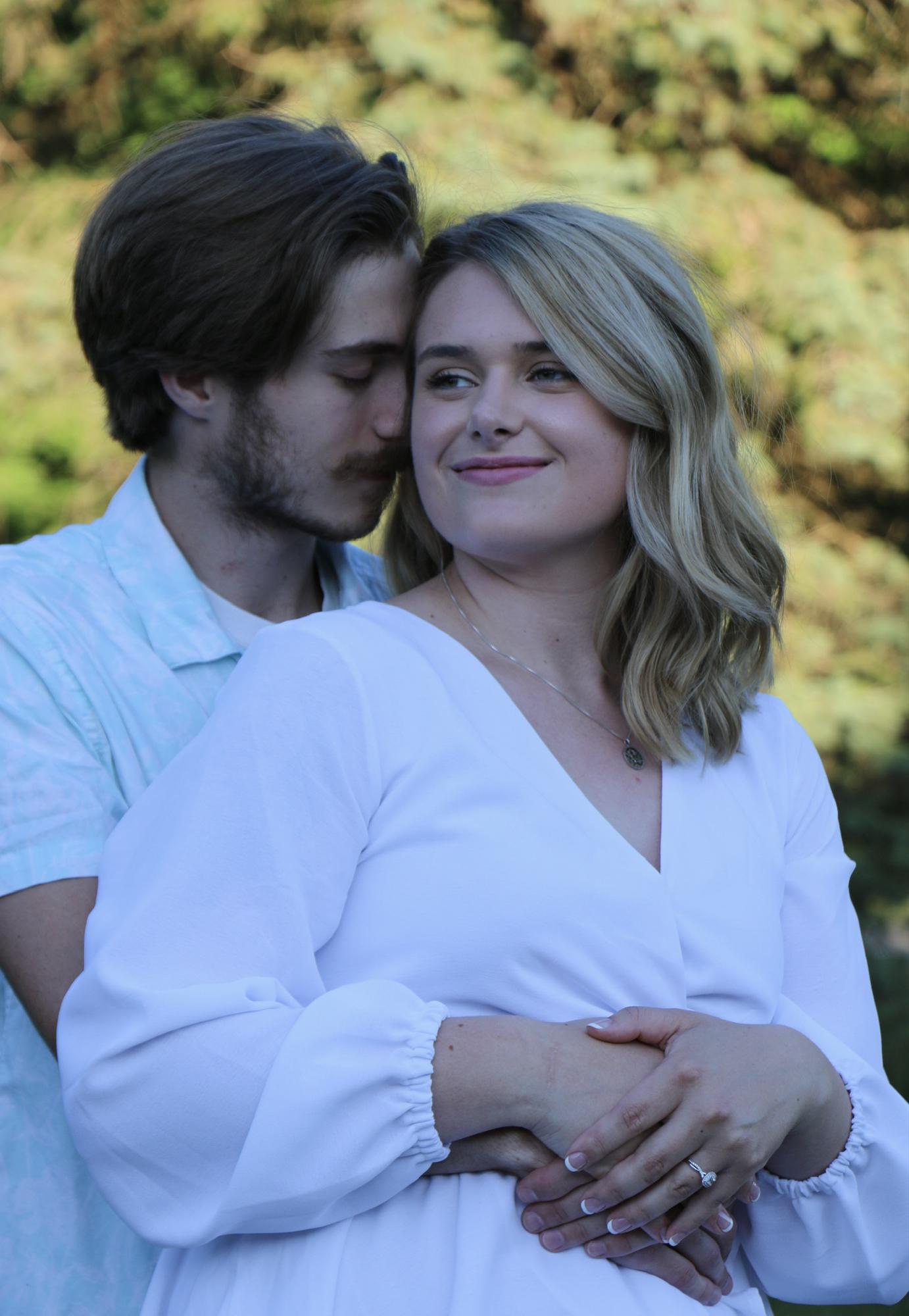 Our engagement pictures.
He proposed on a private and intimate night while we were lighting off fire works. It was a perfect night!