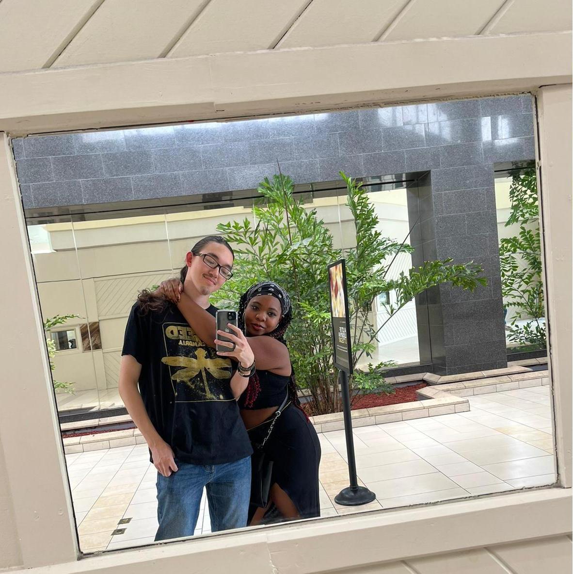 Us chilling at the mall on vacation.