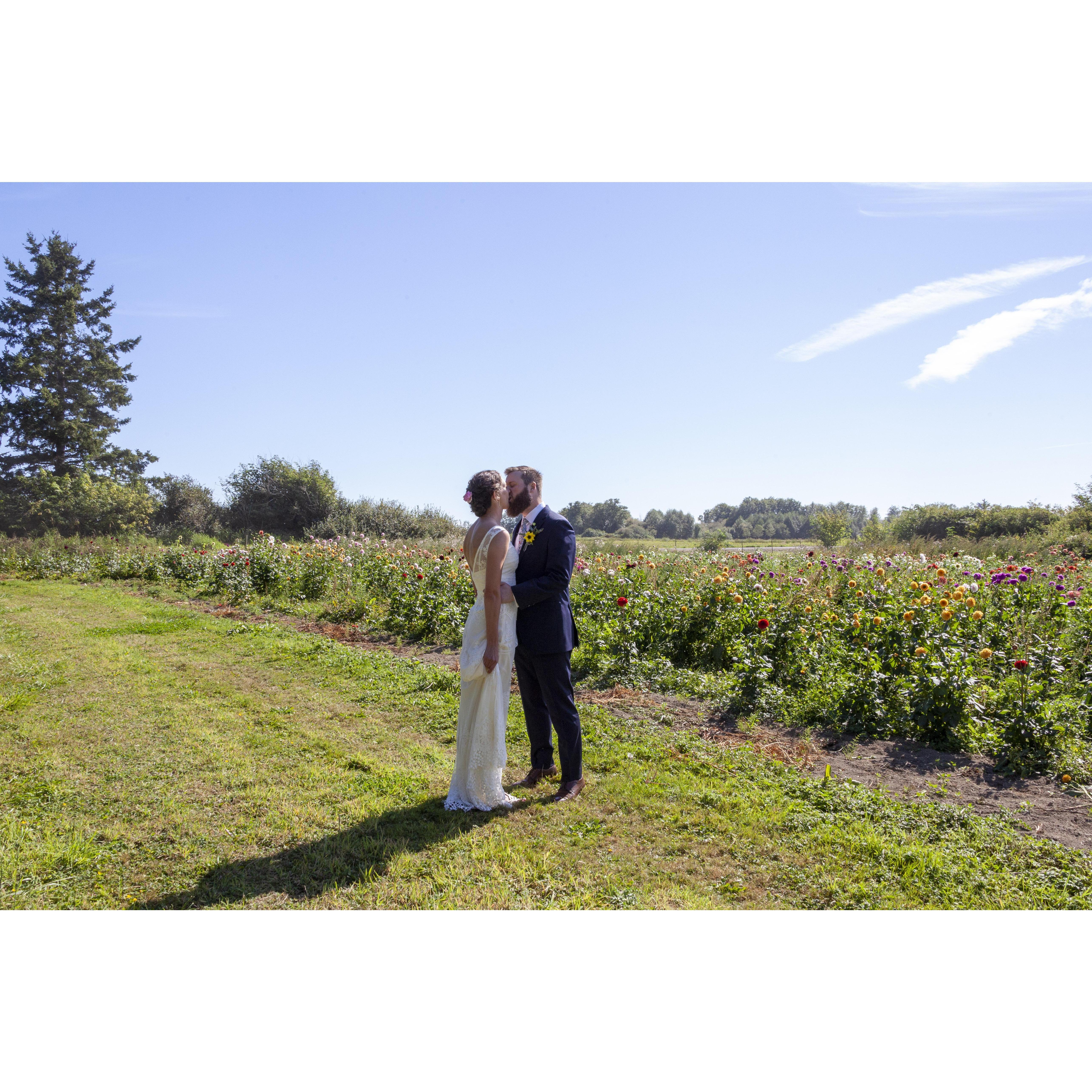 The field next to Wes's home was planted with more than an acre of flowers, many of which made it into the wedding arrangements and served as a stunning backdrop (tended by Mossy Gate Flower Farm).