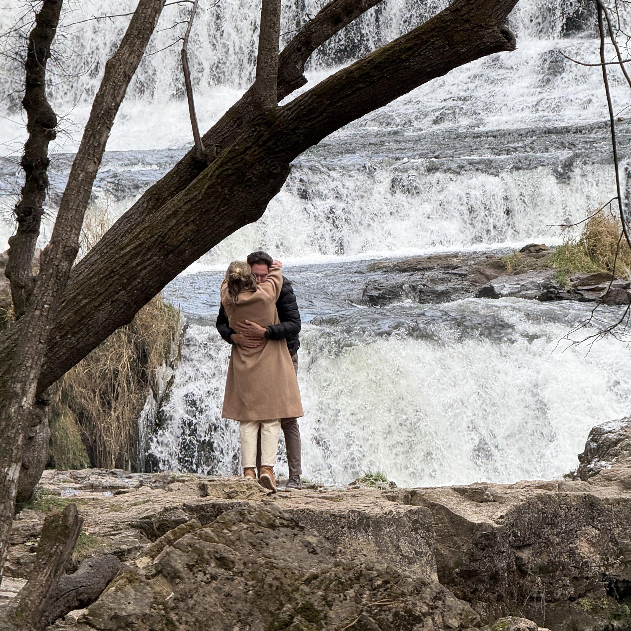 Our engagement took place on Sunday, November 9, 2025 at Willow River State Park in Hudson, Wisconsin, a place Dan and Kayla have grown to love over the past year while spending many hours walking and talking along its trails. Dan made the day especially meaningful by surprising Kayla with the presence of her parents and sister, Julia, along with both of his parents and their pastor, Larry, who were there to witness the proposal.