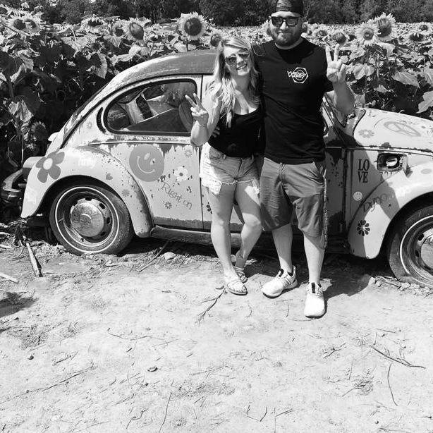 Michele and Lee exploring the sunflower fields together. 2021