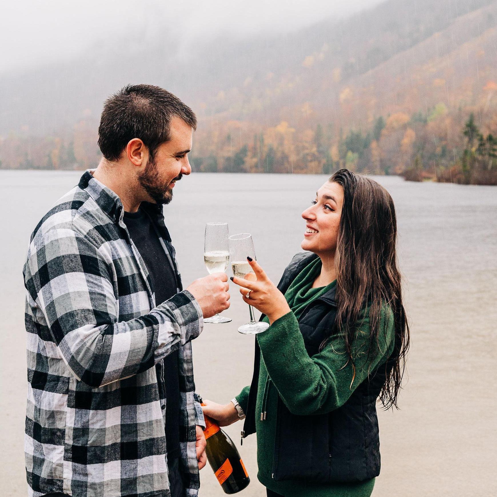 Saying "Cheers!" after almost spraying our photographer with champagne. Echo Lake, 10/18/22
