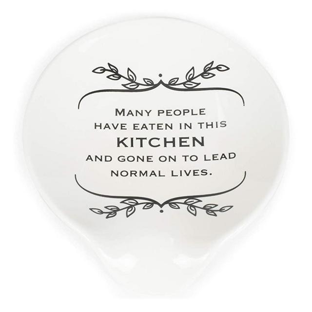 DEMDACO Many People Have Eaten In This Kitchen and Lead Normal Lives 4.5 x 4 Glossy White Ceramic Stoneware Kitchen Spoon Rest