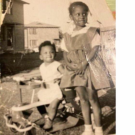 Dr. "Dee" as a young girl with her baby brother, Reggie.