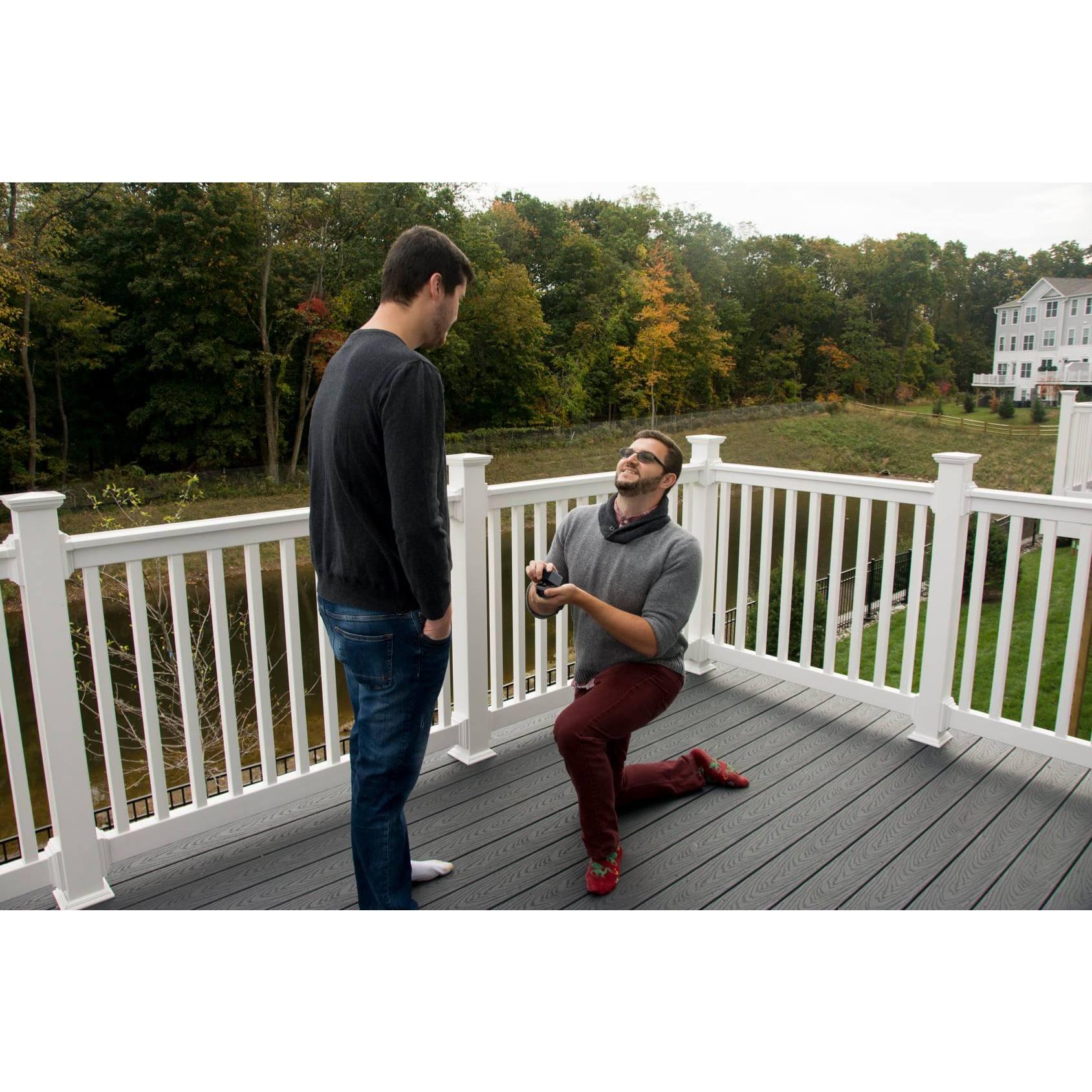 On October 25th Tom proposed to Alex on the balcony of their new home