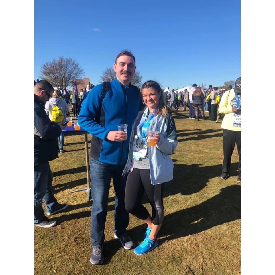 Alex cheered Meaghan on at her first race! He promised to shave his mustache if her mile splits were under 10:00min. Meaghan ran a 9:59 that day.