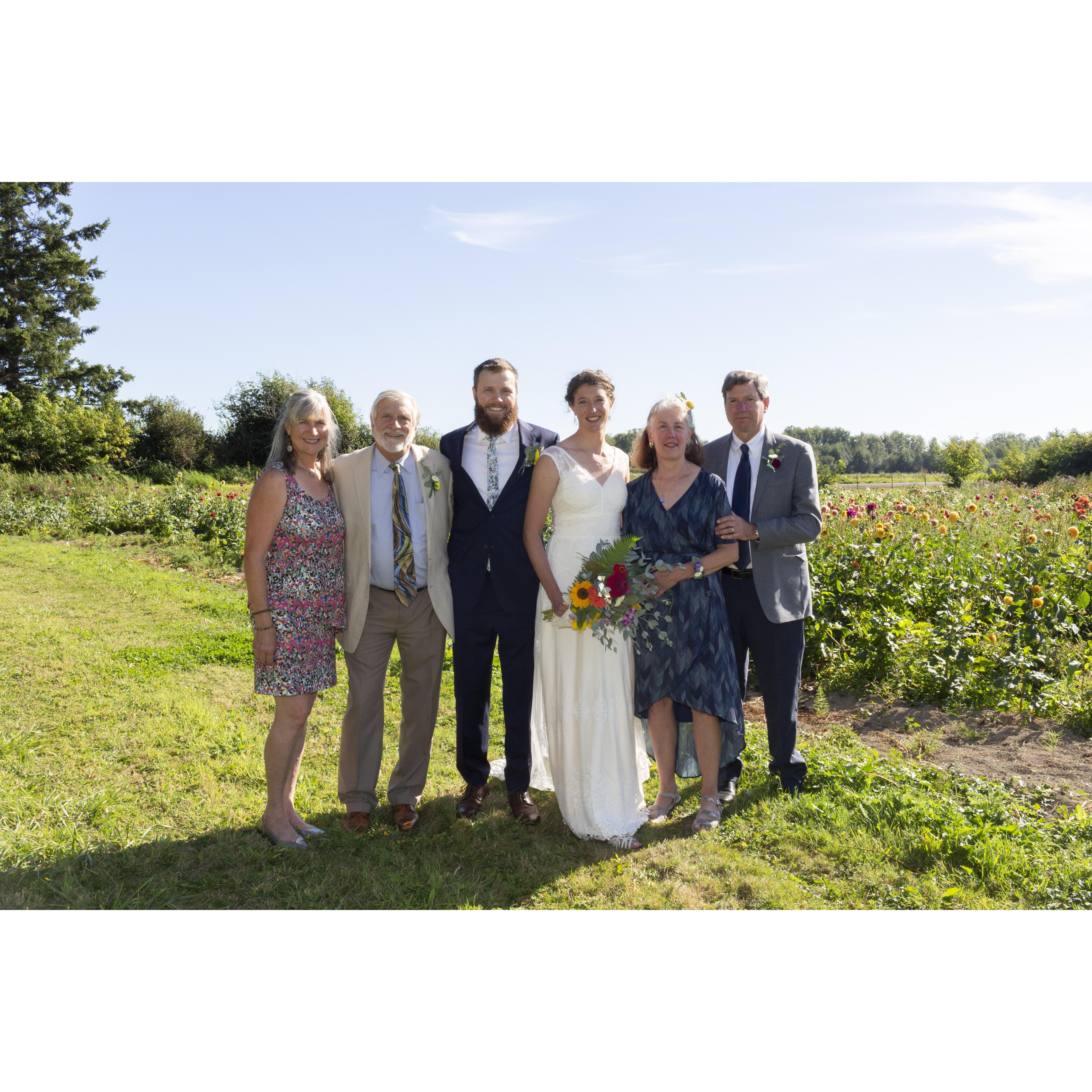 Wes's parents Eileen and Brad are next to Wes. Carrie's parents Audrey and Steve are next to Carrie
