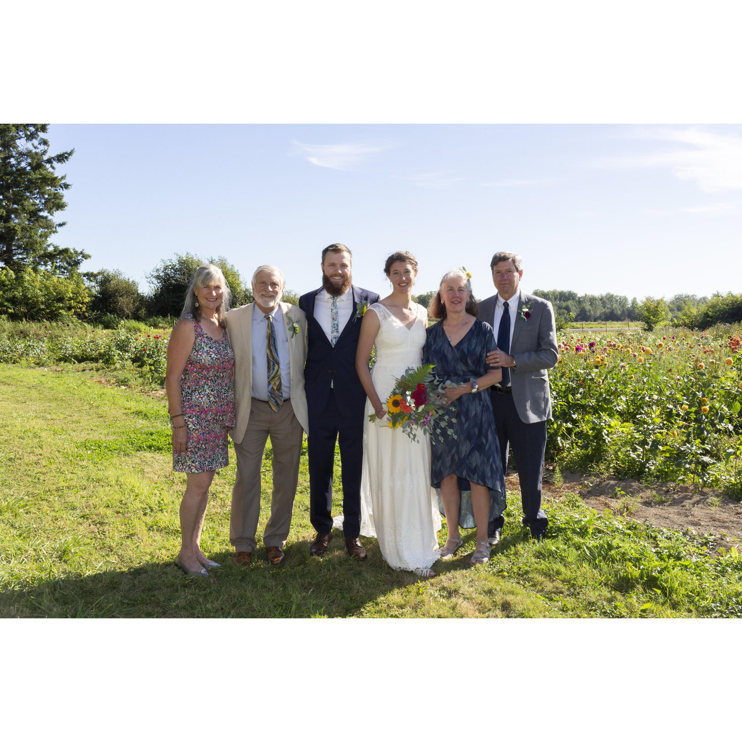 Wes's parents Eileen and Brad are next to Wes. Carrie's parents Audrey and Steve are next to Carrie