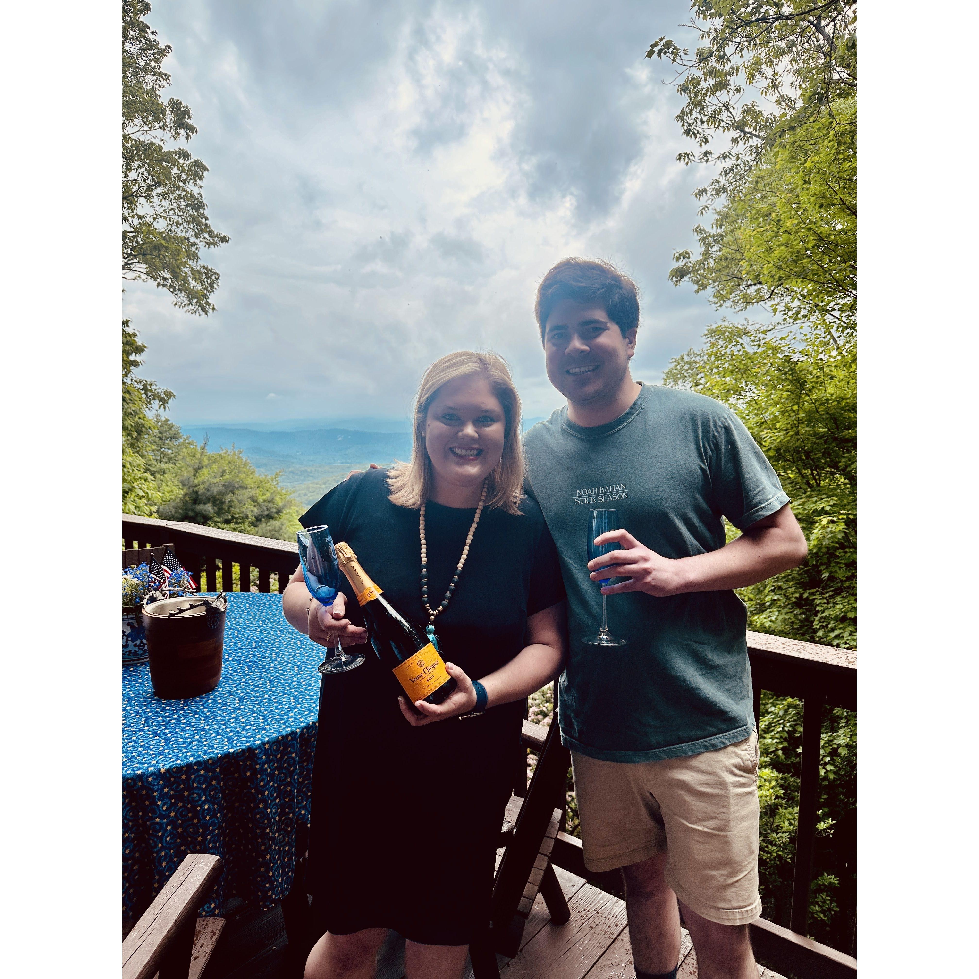 Friends surprised us with celebratory champagne and gifts in High Meadows after our engagement
