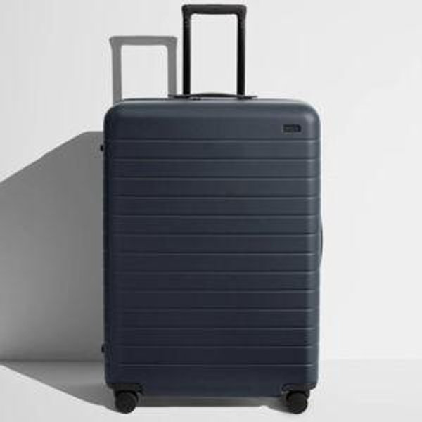 Shop Large & Checked Suitcases in Navy Blue | Away