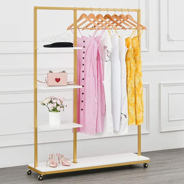 BOSURU Rolling Gold Clothing Racks on Wheels with Metal Pipes Modern Floor Standing Clothes Display Racks Hanging Clothes 4-Tier Garment Rack with Wood Shelves for Bedroom Living Room Cloth Store