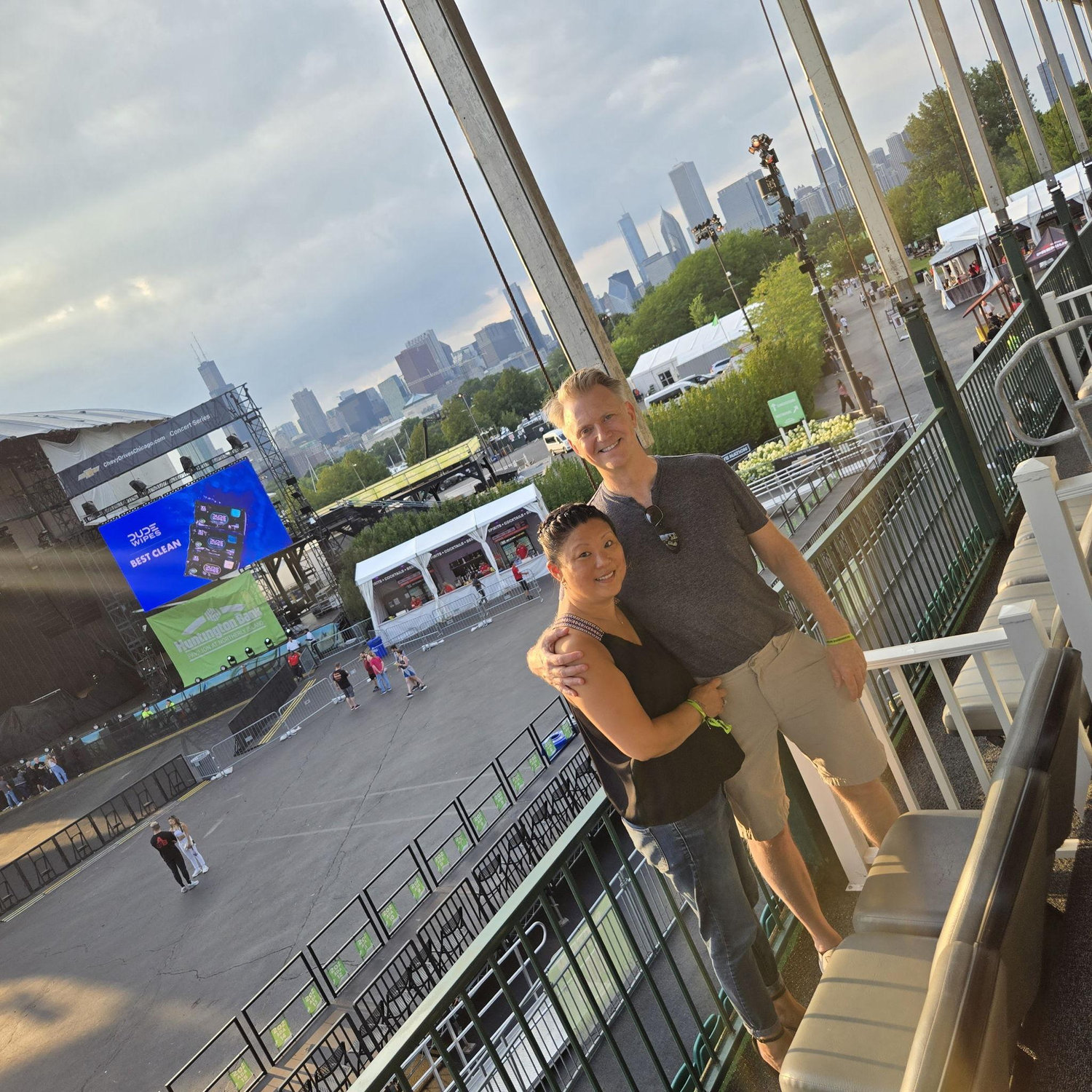 At the "Above and Beyond" concert. Dana got car sick on the ride into the city because Bob used Waze and it took them through a crazy path into the city.