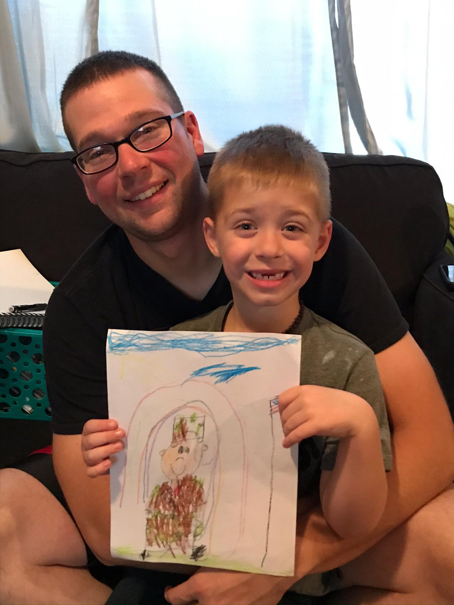 Ember drew Daddy at school for Veterans Day!