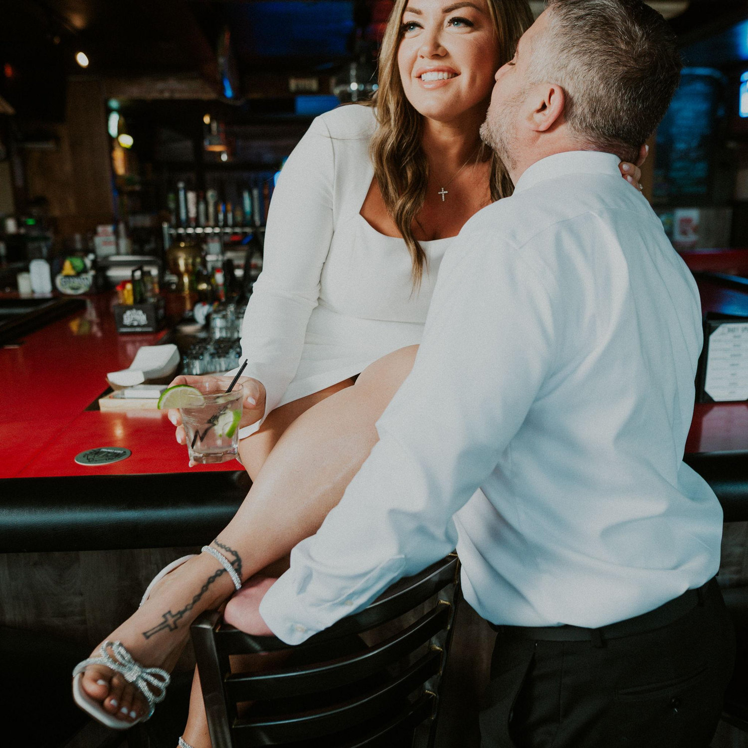 Our photographer told Mike to say something sweet in my ear, he took the opportunity to talk about  my porkchops from dinner the night before, hence the laughter.