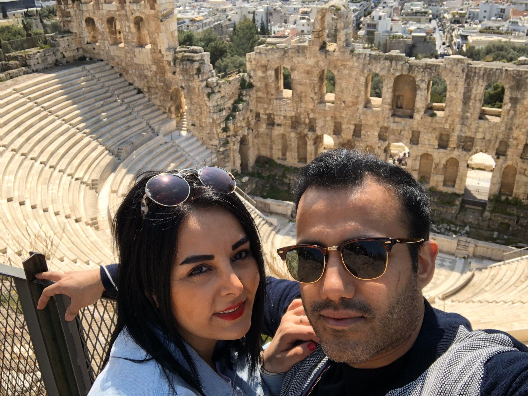 Posing with the Gods of Athens in Greece.