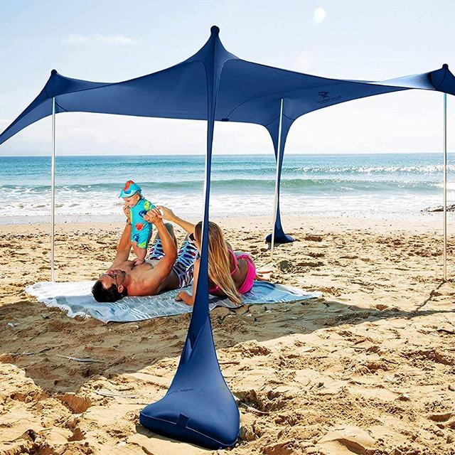 SUN NINJA Pop Up Beach Tent Sun Shelter UPF50+ with Sand Shovel, Ground Pegs and Stability Poles, Outdoor Shade for Camping Trips, Fishing, Backyard Fun or Picnics (7x7.5 FT 4 Pole, Navy)