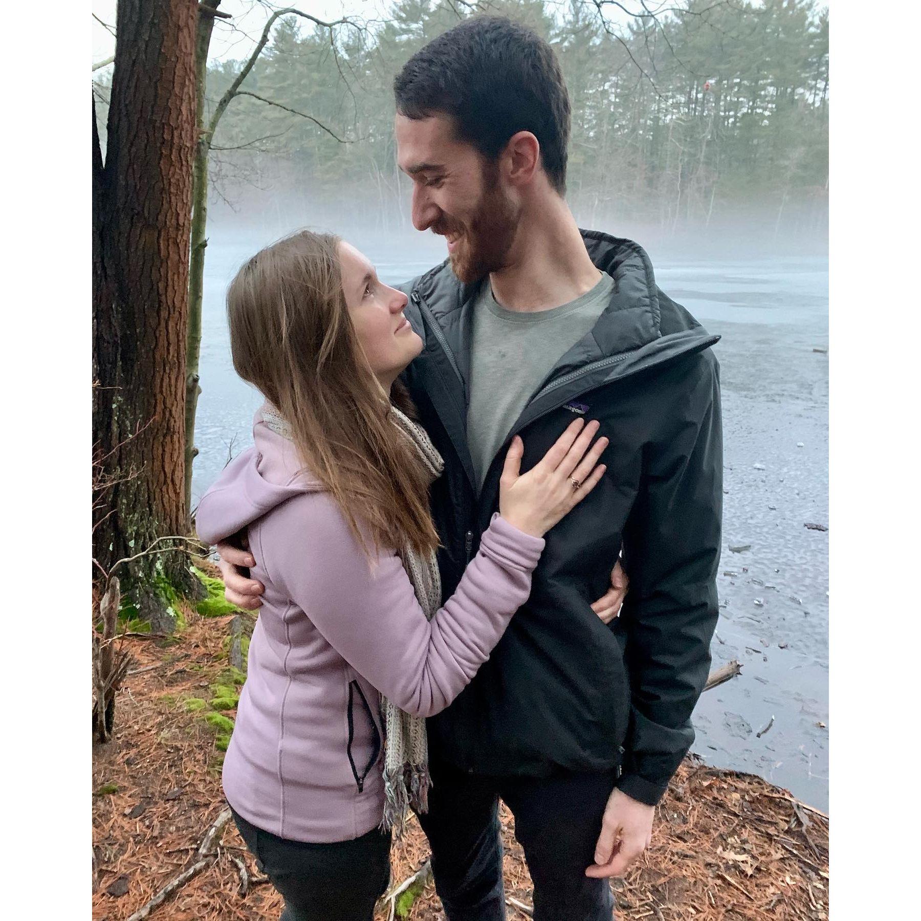 In 2021, Riley and Leah went on a walk in the Massachusetts forest she grew up in. Riley proposed, and Leah said YES!