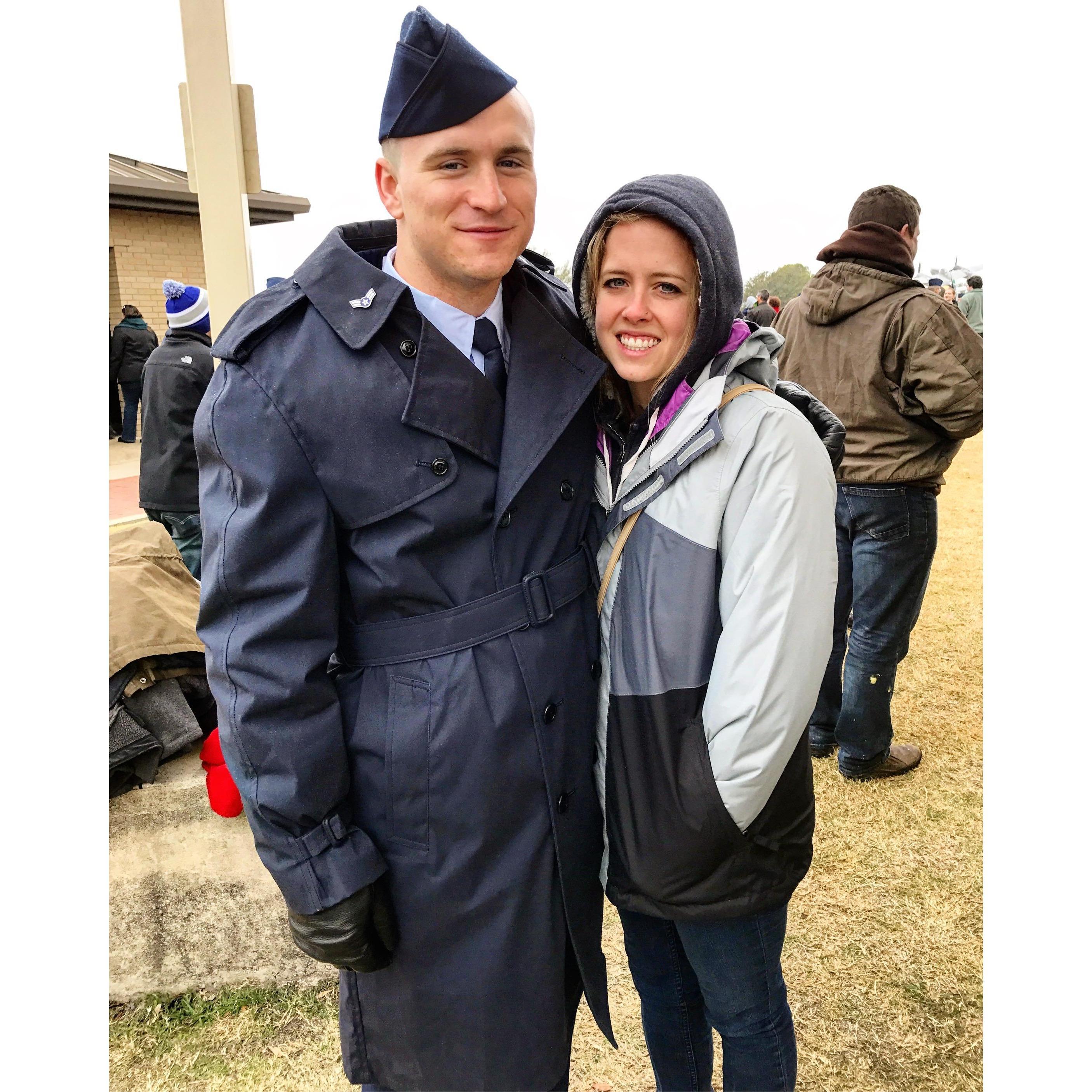 Post Air Force graduation in 40 degrees, windy, and rainy weather.