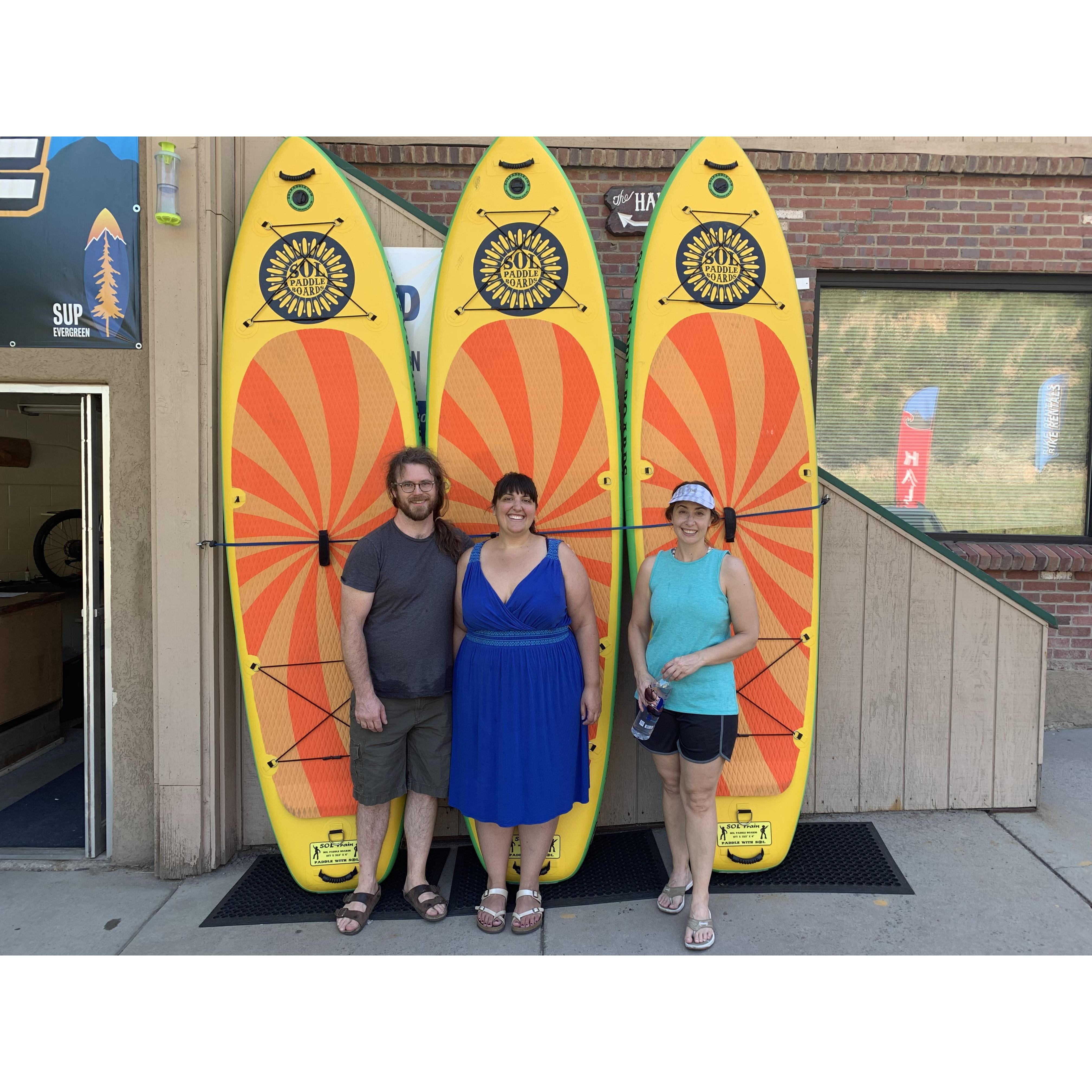 Paddle Boarding! We took Andrea paddle boarding on Evergreen Lake and fell in love with it. The inspiration for the wedding came from this day.
