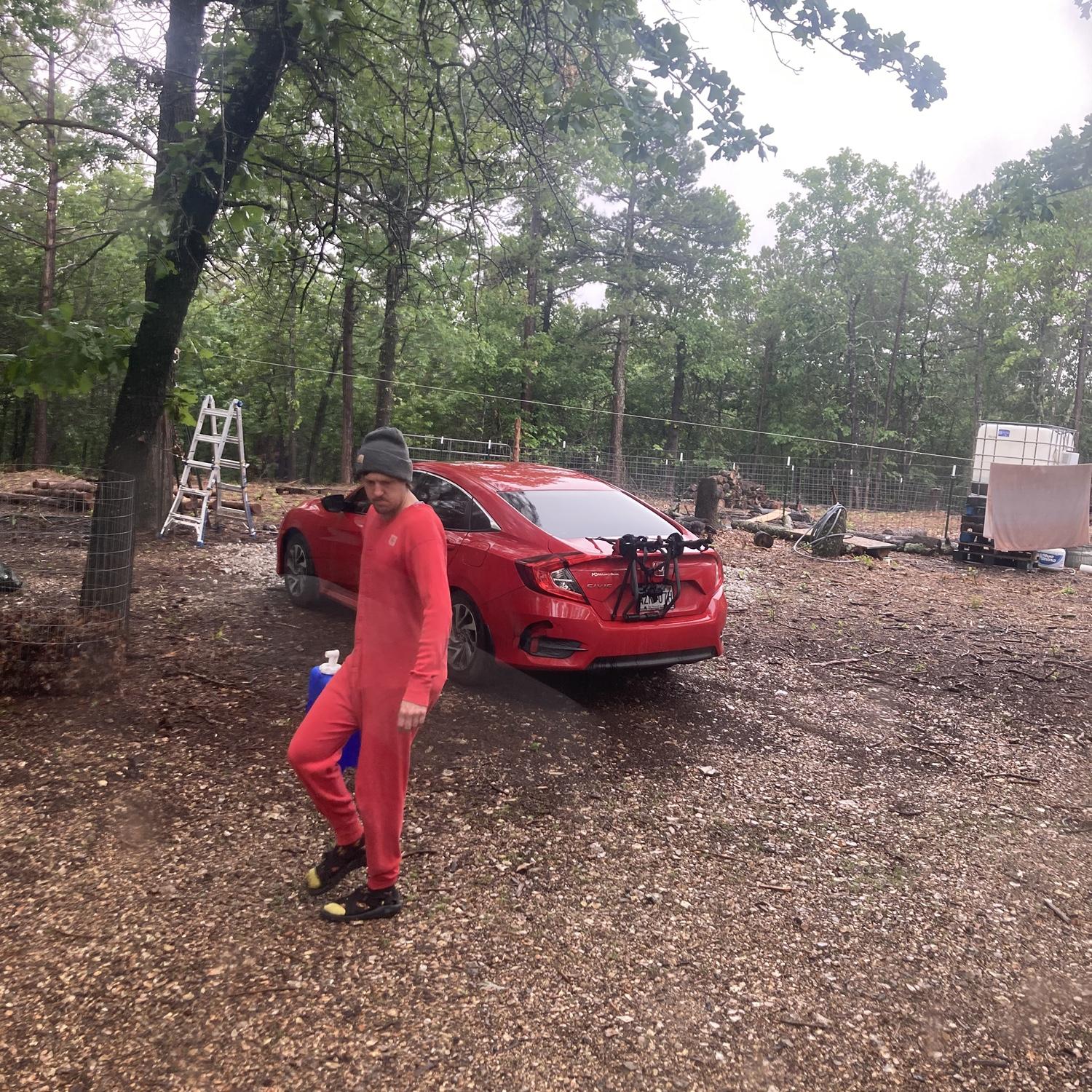Nathan hauling water in long johns