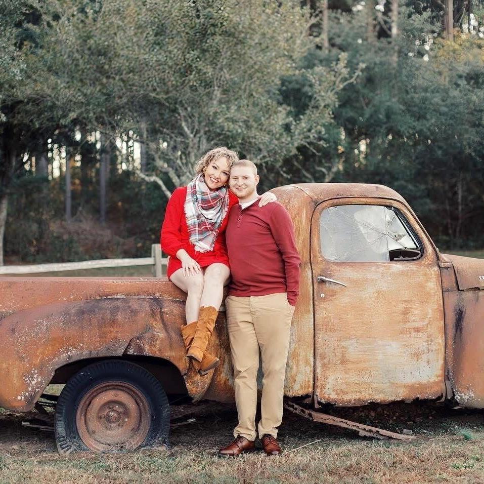 Here is a picture of us with our wedding getaway vehicle that we will ride away in after the reception.