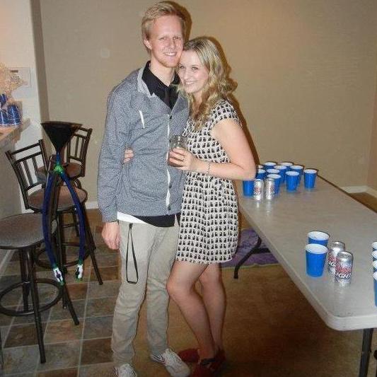 A party at the first house we ever lived in together, Coleman Glen. Note the foreshadowing black cat pattern on Kristen's dress.
