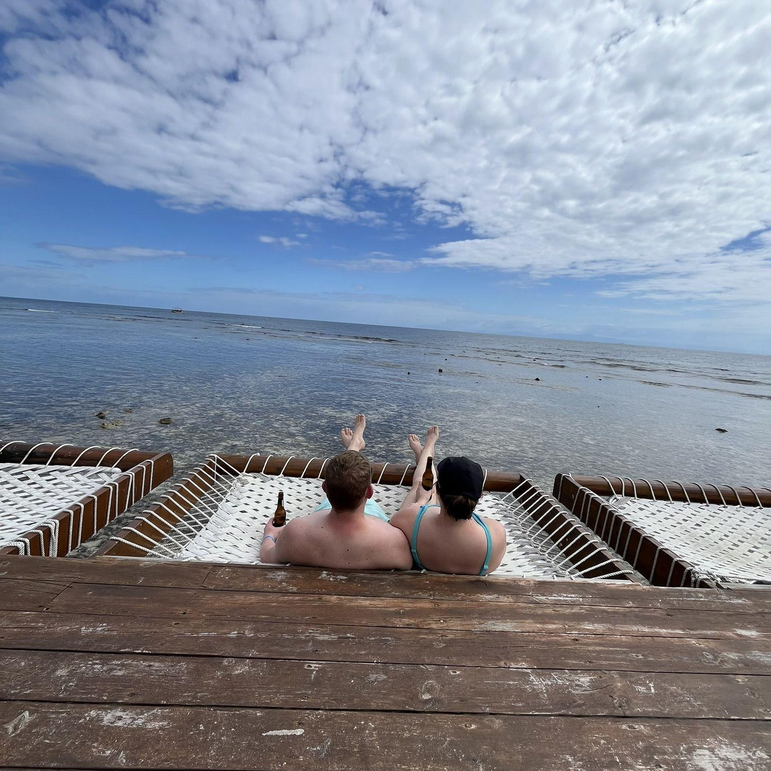 Our love language is relaxing together on the water with a drink in hand. This was taken during an excursion we took during our cruise. This excursion took place in a gorgeous part of Honduras.