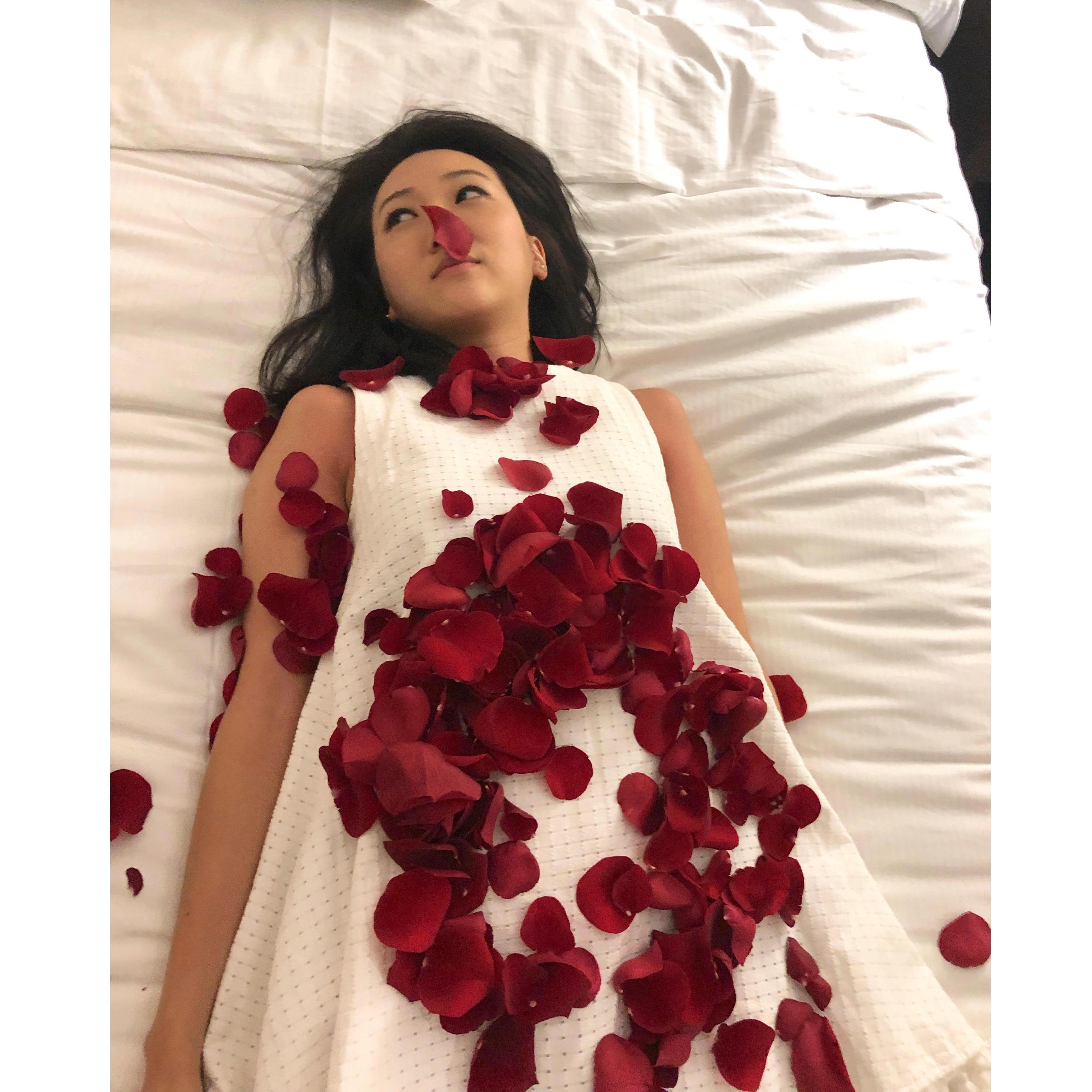 After the proposal, Jay decided to sprinkle Jenn in rose petals.
