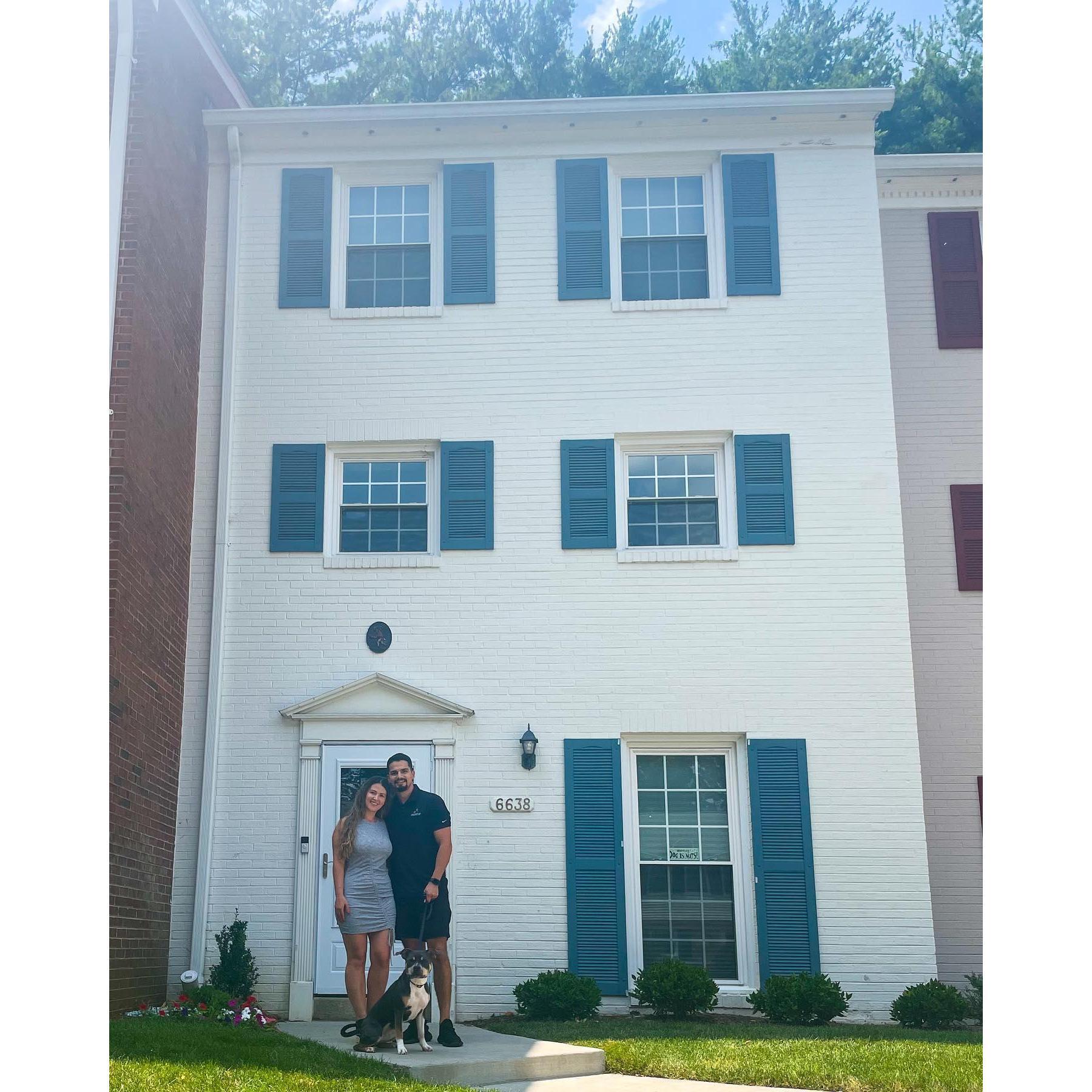 Our little family in front of our first home - June 2021