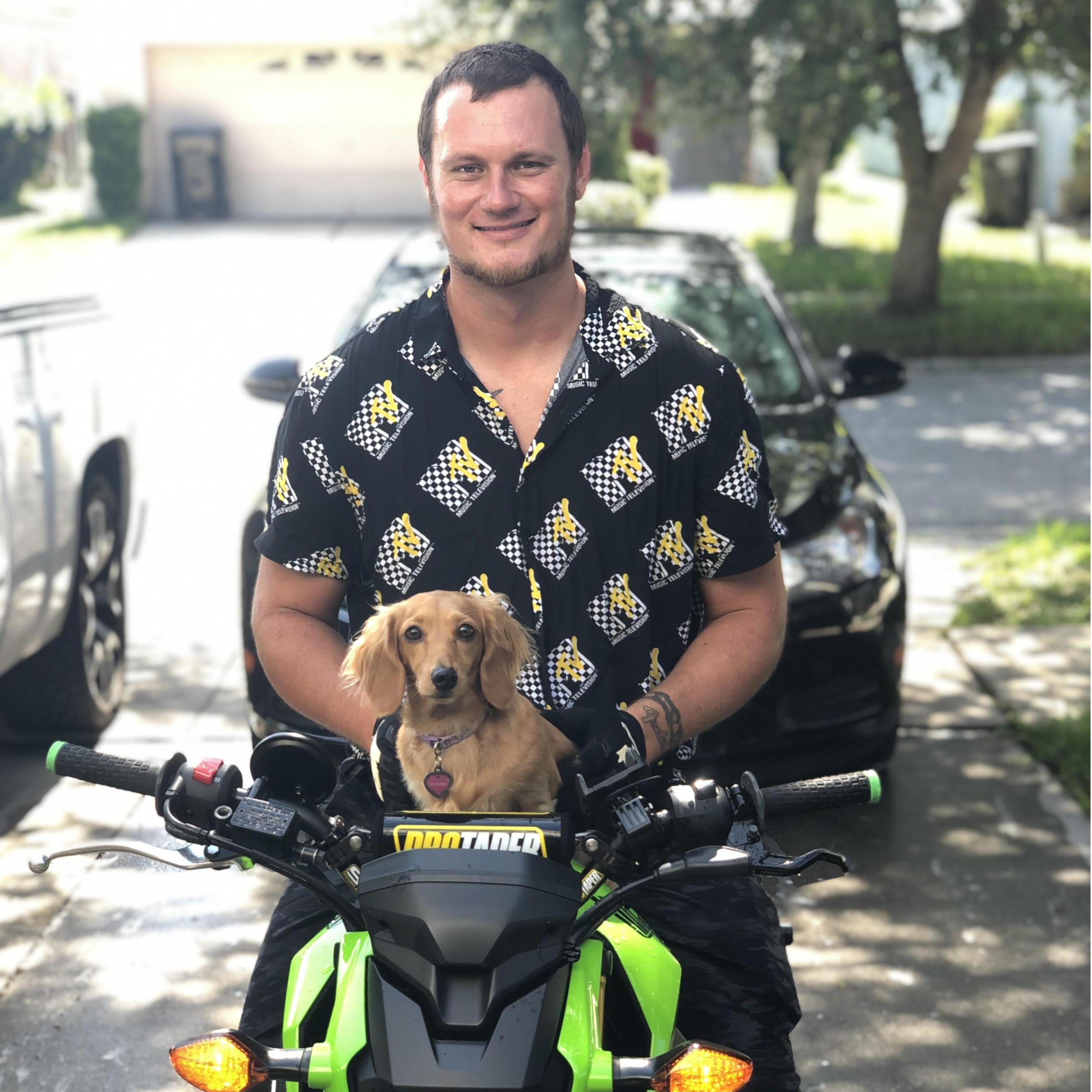 We discovered Hope LOVES to ride the Grom.
