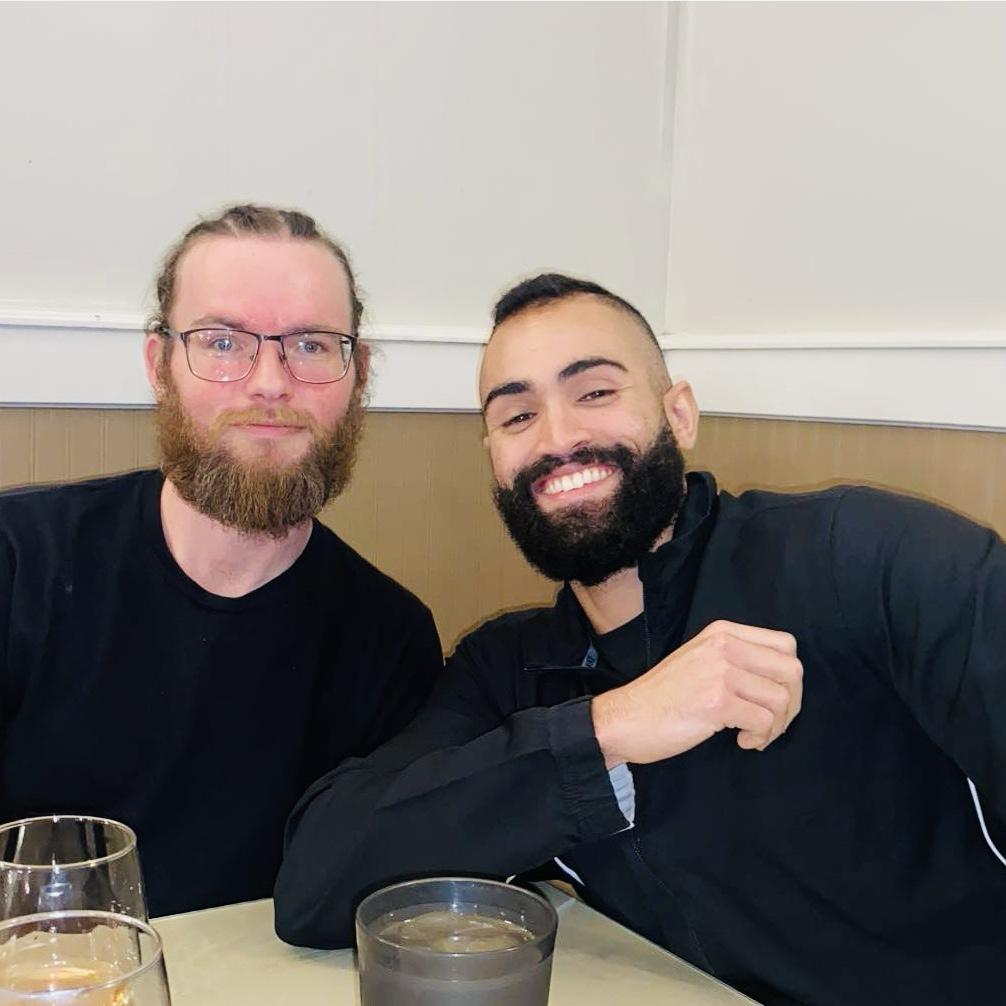 The groom and one of his groomsman at the catering tasting!