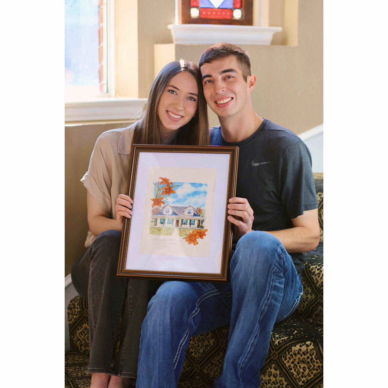 Us posing with a painting I did of Ian's mom's home - such a sweet memory! December 2024