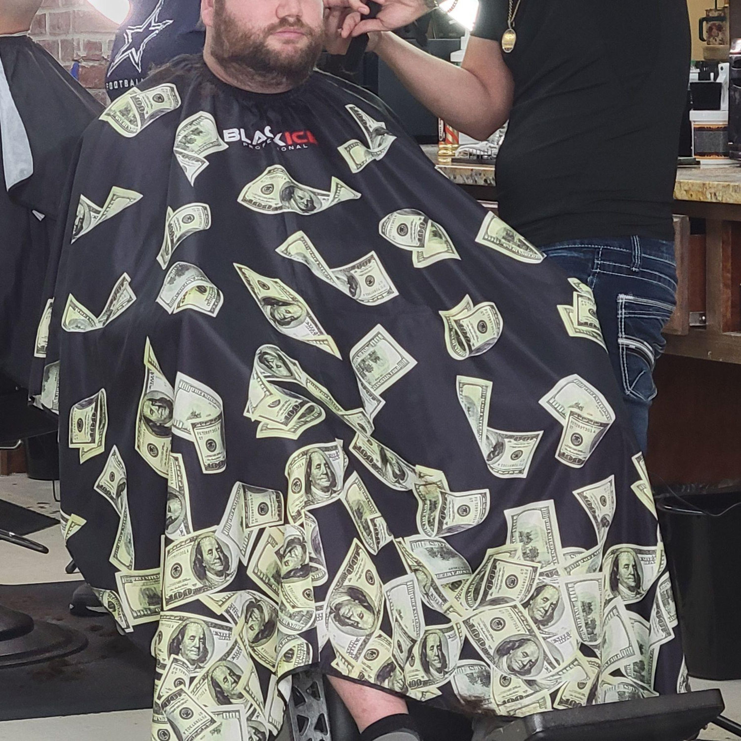 Getting his hair cut