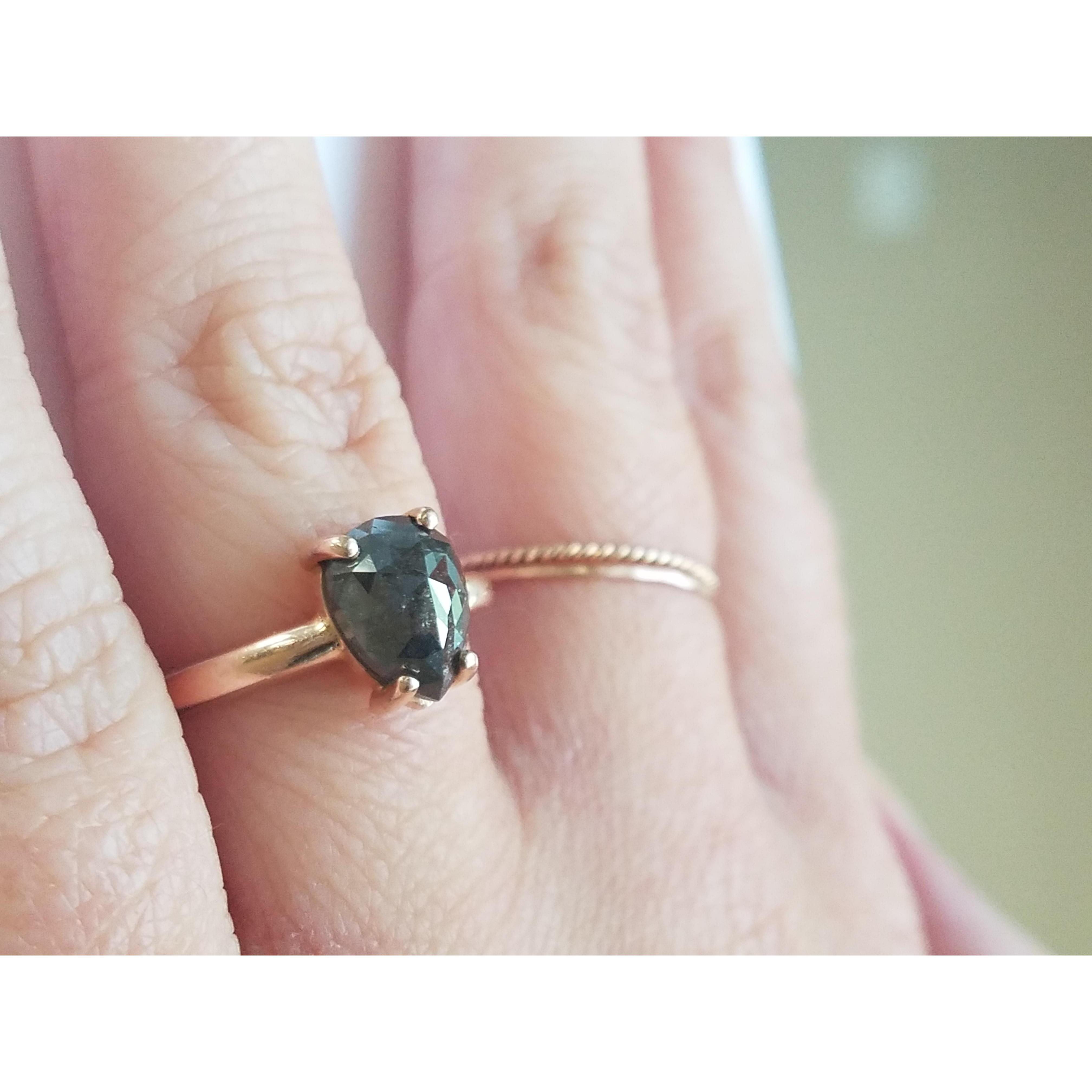 Brian’s fascination with astronomy (and Shay!) inspired him to choose a dark, Salt and Pepper Diamond ring. A pretty little galaxy on her finger.